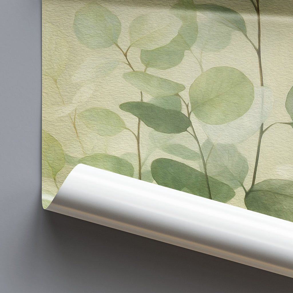 Roll of green leaf-patterned paper on a gray background