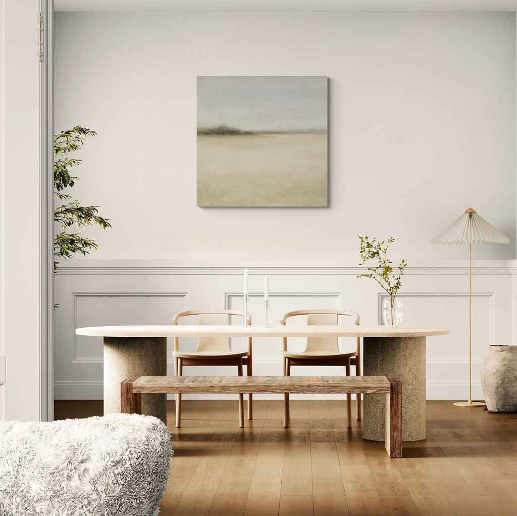 Modern dining room with a table, chairs, and a bench against a white wall with a painting.