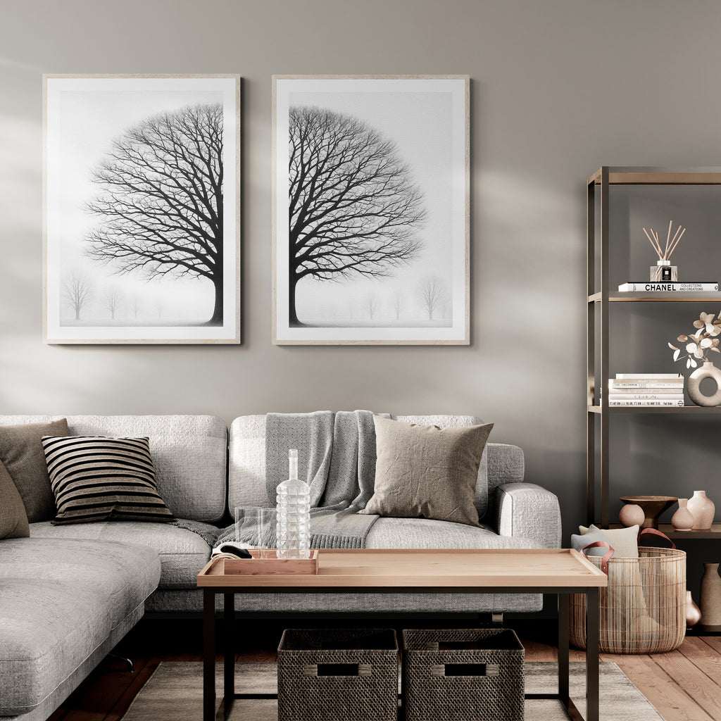 Modern living room with a sectional sofa, coffee table, and wall art.