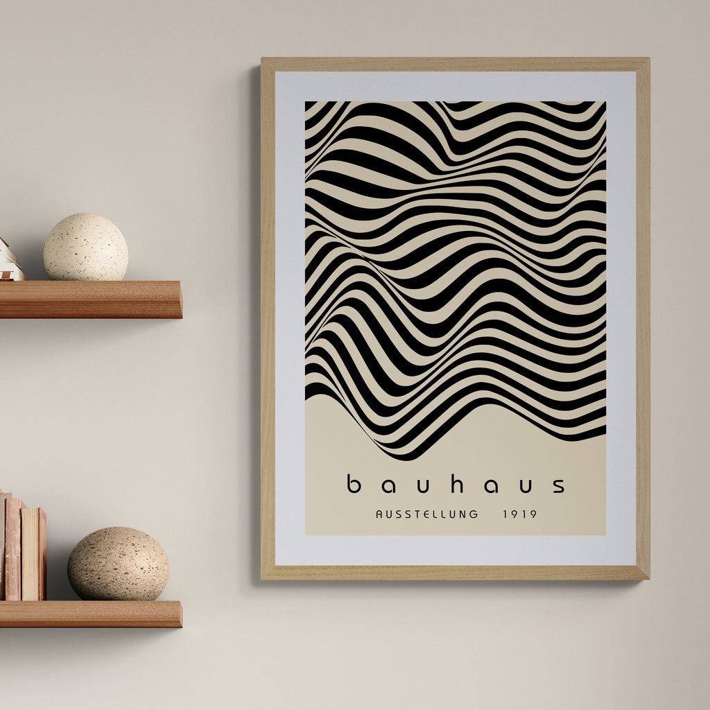 Framed Bauhaus poster with wavy line design on a beige wall.