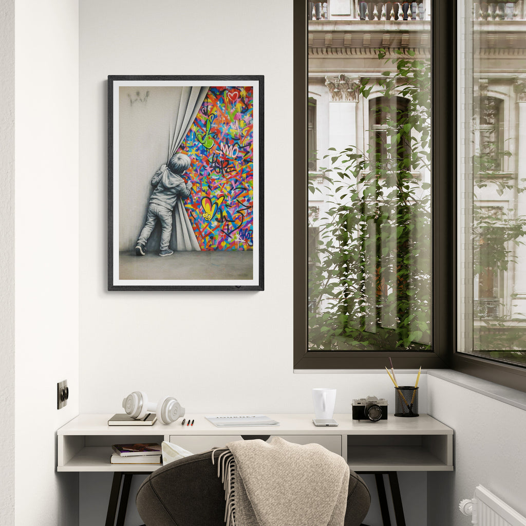 Modern office interior with a colorful framed artwork on the wall.