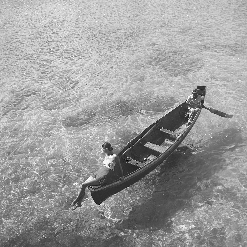 Fashion Photograhy - Model On Boat In Montego Bay by Toni Frissell